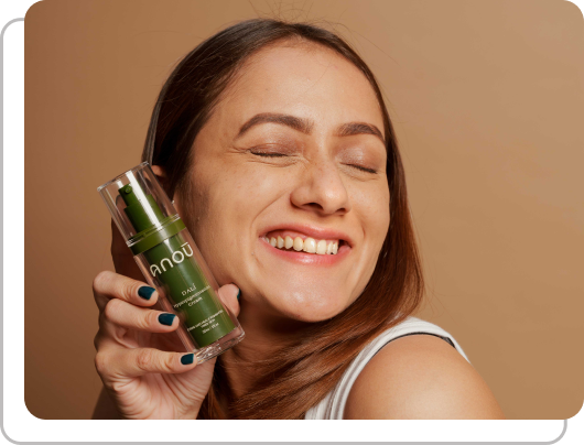 happy woman showing anou dali product